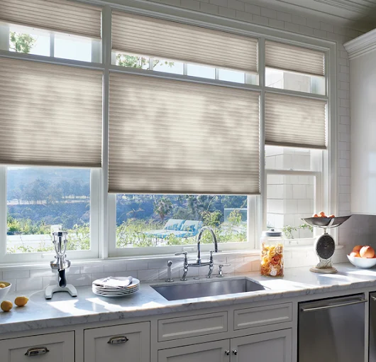 Kitchen window with Hunter Douglas Duette cellular shades